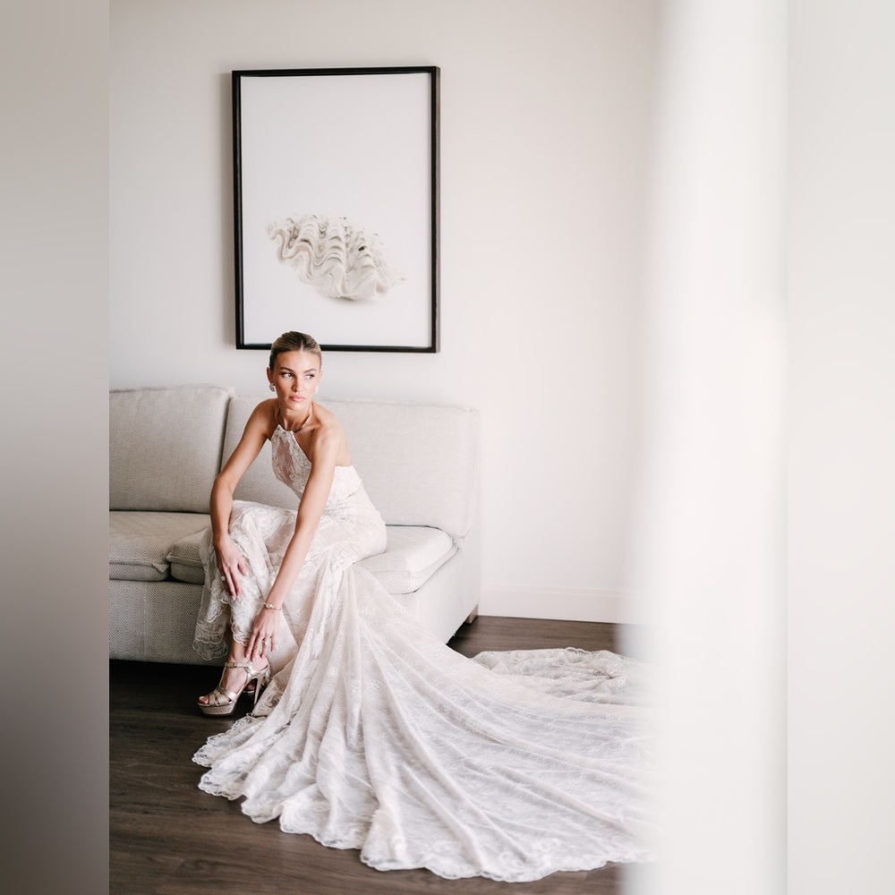 Gahlia Lahav  wedding mermaid dress made of embroidered French lace.